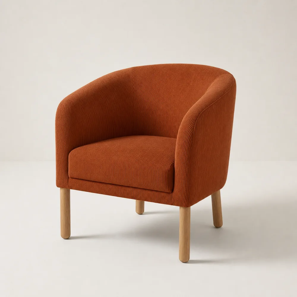 The tub chair in rust corduroy